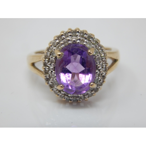 207 - 9ct Gold Diamond & Amethyst Set Ring: Size L: Gross weight 3.21g