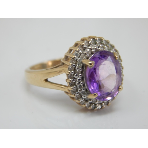 207 - 9ct Gold Diamond & Amethyst Set Ring: Size L: Gross weight 3.21g