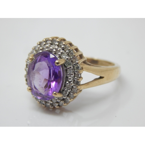 207 - 9ct Gold Diamond & Amethyst Set Ring: Size L: Gross weight 3.21g