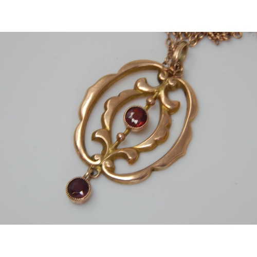 210 - Antique 9ct Gold Garnet Set Pendant with en tremble Garnet Drop on 9ct Gold Chain: Gross weight 3.01... 