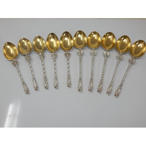 107 - A Set of 10 Continental White Metal Apostle Spoons with Gilded Bowls: Weight 168g