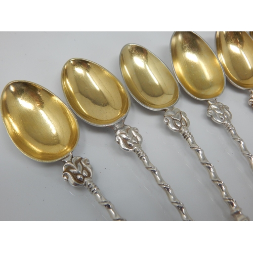 107 - A Set of 10 Continental White Metal Apostle Spoons with Gilded Bowls: Weight 168g