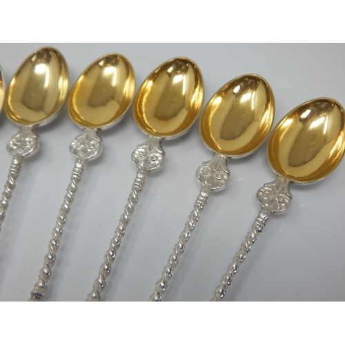 107 - A Set of 10 Continental White Metal Apostle Spoons with Gilded Bowls: Weight 168g