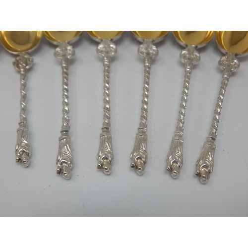 107 - A Set of 10 Continental White Metal Apostle Spoons with Gilded Bowls: Weight 168g