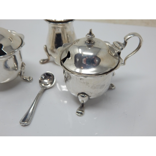 108 - George V Silver Cruet Set Comprising Mustard Pot, Lidded Salt, Pepperette & Spoon. Silver weight 122... 