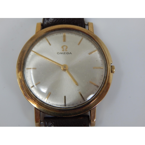 156 - Gentleman's 9ct Gold OMEGA Mid Size Wristwatch 1964 with replacement winder on Brown Leather Strap. ... 