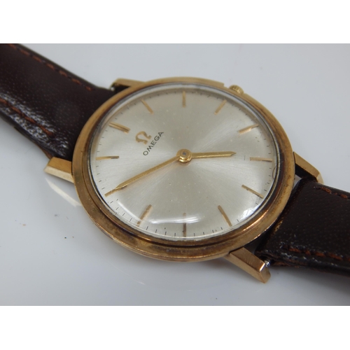 156 - Gentleman's 9ct Gold OMEGA Mid Size Wristwatch 1964 with replacement winder on Brown Leather Strap. ... 