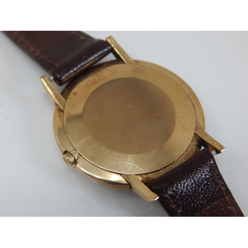 156 - Gentleman's 9ct Gold OMEGA Mid Size Wristwatch 1964 with replacement winder on Brown Leather Strap. ... 