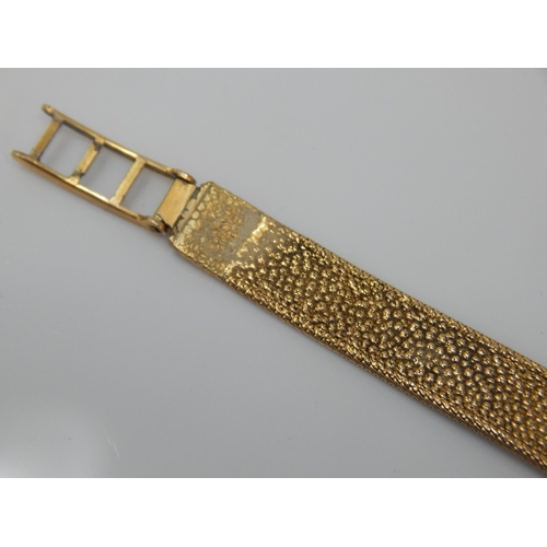 219 - Ladies 9ct Gold Wristwatch on 9ct Gold Strap: Gross weight 18g