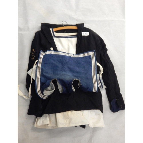 WWII Royal Navy uniform including shirt trousers over jacket