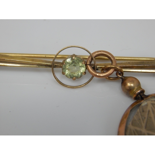 224 - 9ct Gold Peridot Set Brooch together with a 9ct Gold Double Sided Locket, 9ct Scrap Gold Ring & Watc... 