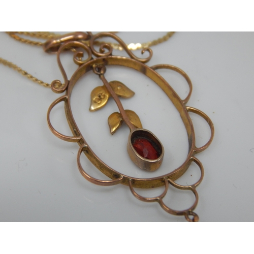 225 - Edwardian 9ct Gold Garnet & Seed Pearl Set En-tremble pendant on 9ct Chain. Gross weight 3.02g