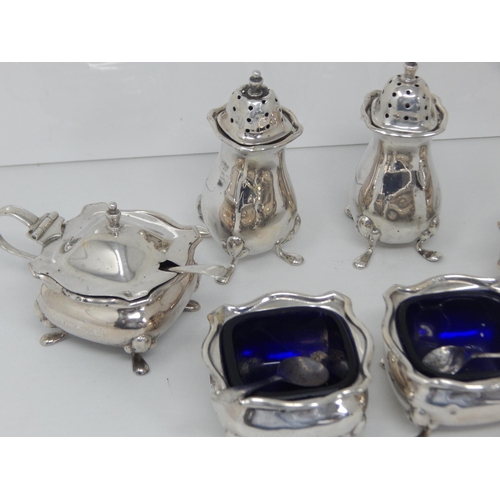 135 - A Six Piece Silver Cruet Set with Spoons: Marks Rubbed: Silver Weight 202g