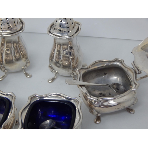 135 - A Six Piece Silver Cruet Set with Spoons: Marks Rubbed: Silver Weight 202g