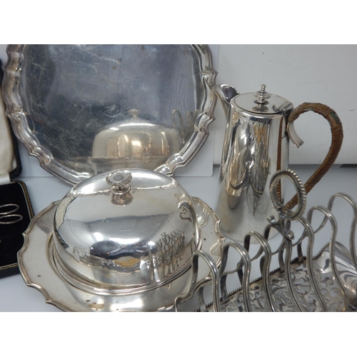 138 - A Quantity of Silver Plated Wares & White Metal Including Toast Racks, Napkin Rings, Salver, Flatwar... 