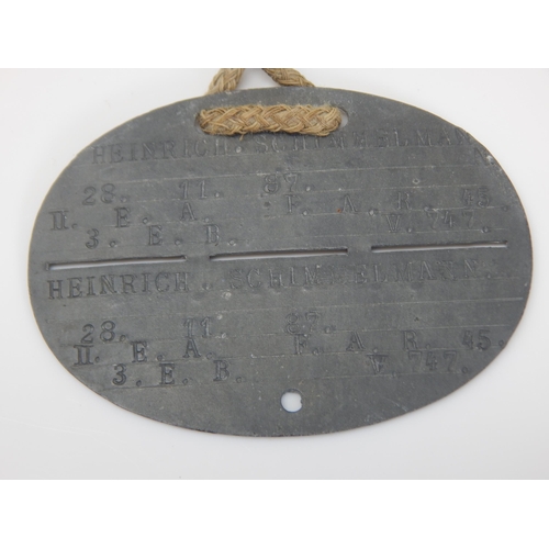 396 - WWI German Soldiers Identity Disc: HEINRICH SCHIMMELMANN. 28.11.87  II.E.A  F.A.R.45  3. E.B  V.747