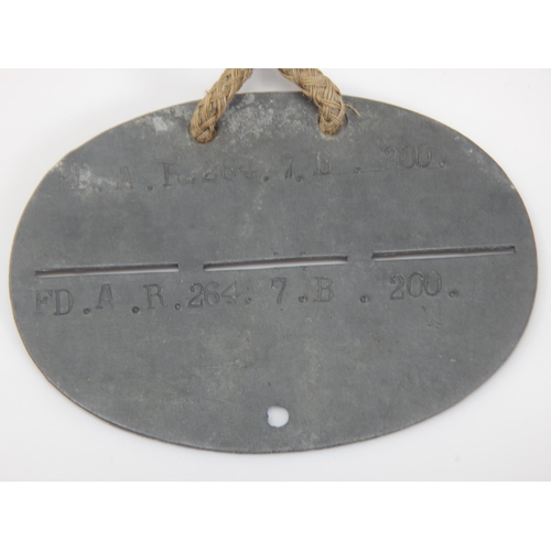 396 - WWI German Soldiers Identity Disc: HEINRICH SCHIMMELMANN. 28.11.87  II.E.A  F.A.R.45  3. E.B  V.747