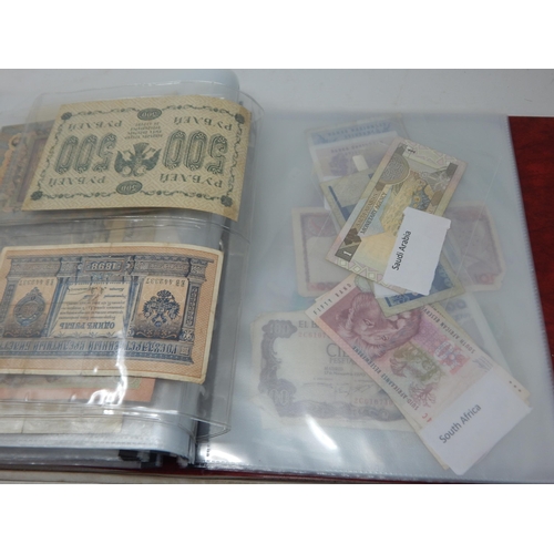 74 - A Folder Containing a Large Quantity of World Banknotes Including China, Germany, Great Britain, Ire... 