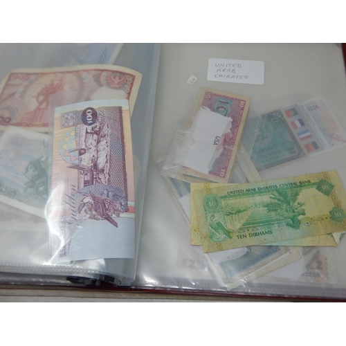 74 - A Folder Containing a Large Quantity of World Banknotes Including China, Germany, Great Britain, Ire... 