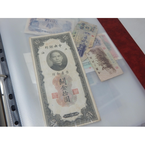 74 - A Folder Containing a Large Quantity of World Banknotes Including China, Germany, Great Britain, Ire... 