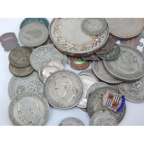 87 - A Quantity of Pre-1947 Silver Coinage, Charms & Medallion: Weight 140g