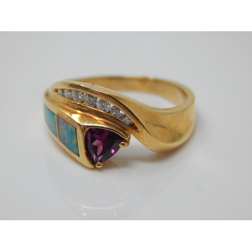 184 - 18ct Gold Diamond, Ruby & Opal Set Ring: Size O/P: Gross weight 6.23g