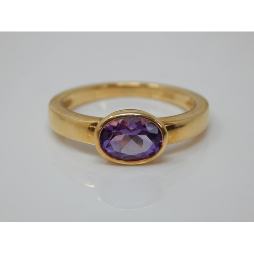 185 - 18ct Gold Amethyst Set Ring: Size O/P: Gross weight 3.89g