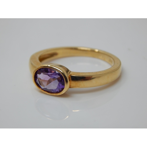 185 - 18ct Gold Amethyst Set Ring: Size O/P: Gross weight 3.89g