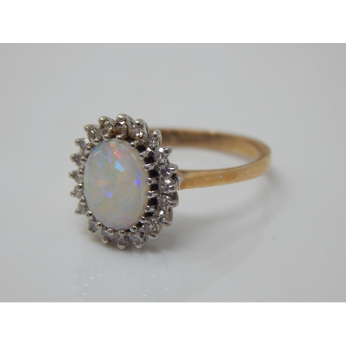 191 - 9ct Gold Opal Set Ring: Size O: Gross weight 2.58g