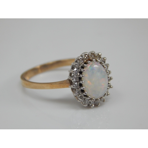 191 - 9ct Gold Opal Set Ring: Size O: Gross weight 2.58g