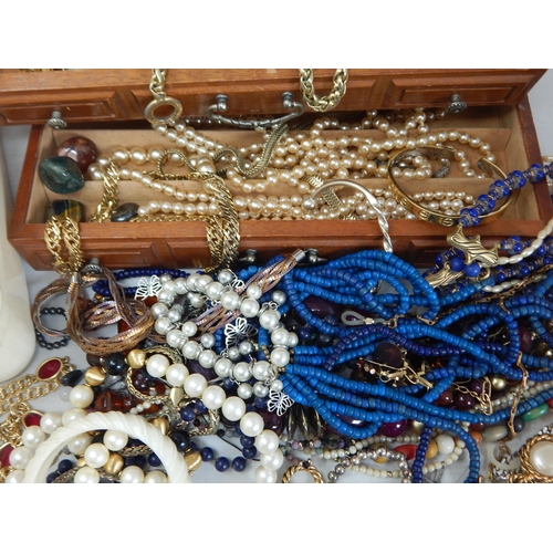 282 - A Huge Quantity of Costume Jewellery & Jewellery Case. Sorting will reward.