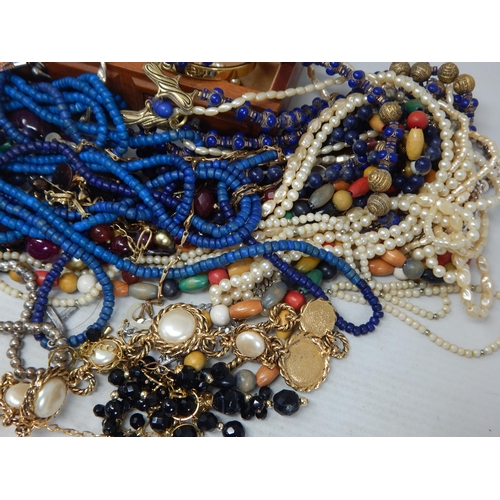 282 - A Huge Quantity of Costume Jewellery & Jewellery Case. Sorting will reward.