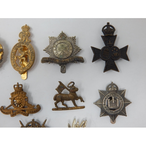 516 - Military Cap Badges Including Tank Corps, Royal Welsh Fusiliers, Hussars etc