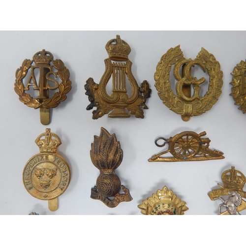 518 - Quantity of Military Cap Badges etc