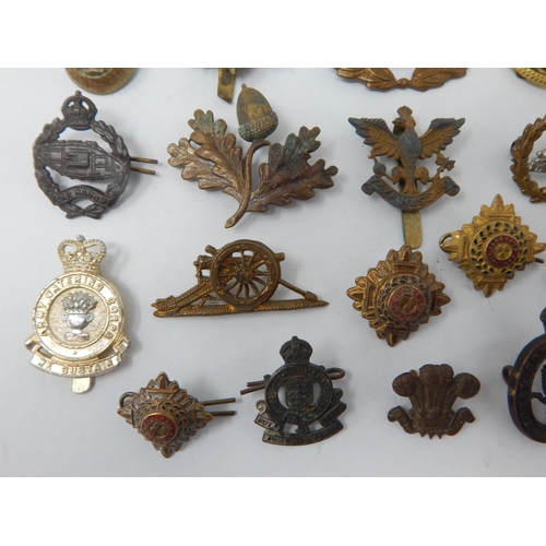 519 - Quantity of Military Cap Badges Including Hussars, Royal Navy Army Service Corps