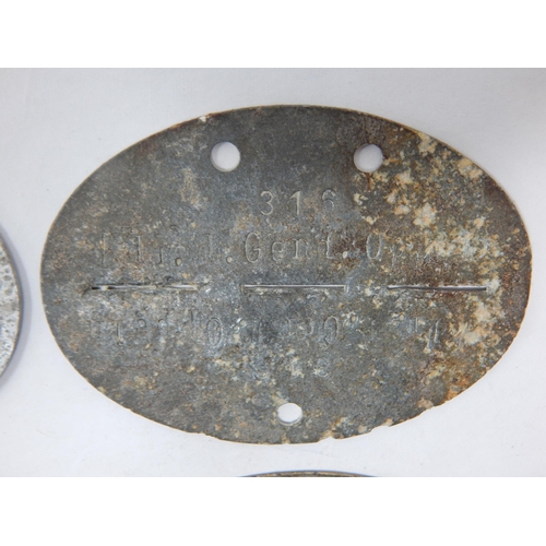 571 - WWII German Erkennungsmarke (Identification Tag): this was the standard-issue German military identi... 