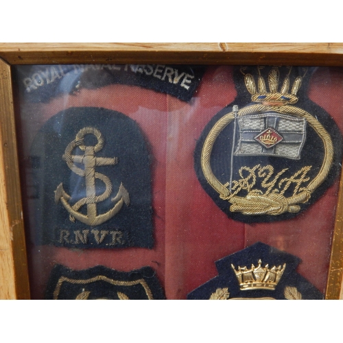 584 - A Quantity of Framed Naval Cloth Badges Including The Royal Yacht