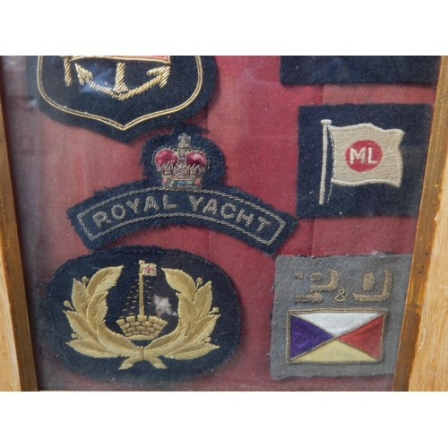 584 - A Quantity of Framed Naval Cloth Badges Including The Royal Yacht