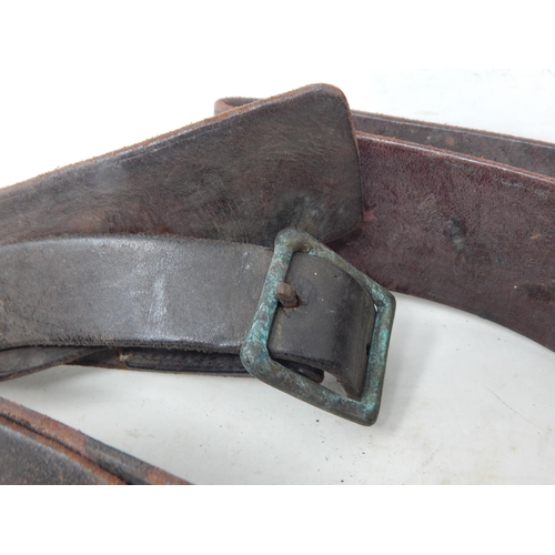 621 - WWI Royal Horse Artillery Leather Belt together with a Leather Sam Browne Belt.