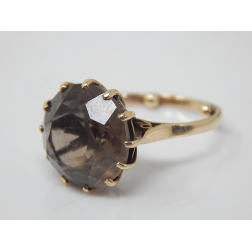 165 - 9ct Gold Ring Set with a Smoky Quartz: Size F: Gross weight 3.05g