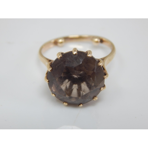 165 - 9ct Gold Ring Set with a Smoky Quartz: Size F: Gross weight 3.05g