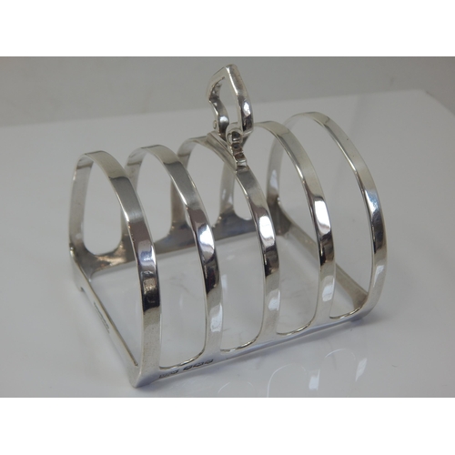 148L - Silver 4 Slice Toast Rack Hallmarked Sheffield 1936 by Mappin & Webb together with a Silver Tray Hal... 