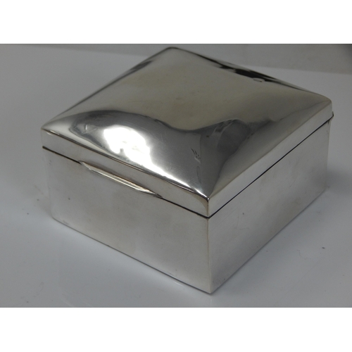 148P - Silver Cigarette Box with Cedar Lined Interior: Hallmarked Chester, Date Letter Rubbed: 9cm Diameter... 