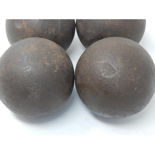 377 - 4 x Antique Cannonballs, each weighing approx 2kg (5lb)