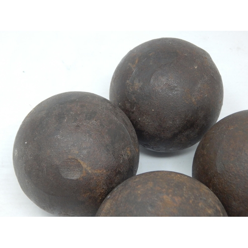 377 - 4 x Antique Cannonballs, each weighing approx 2kg (5lb)