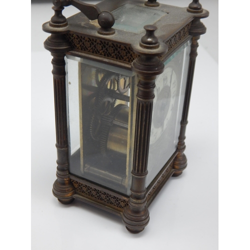 382 - A 19th Century Brass Cased Carriage Clock with White Enamel Dial.