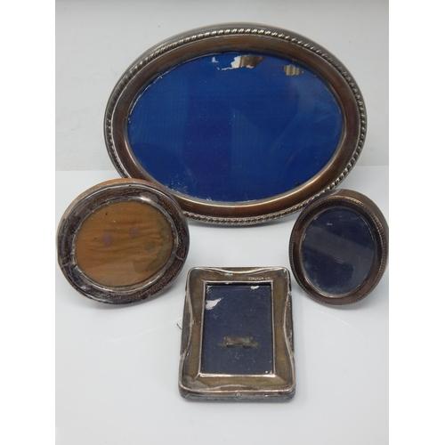 59 - 3 x Hallmarked Silver photograph Frames: Various Dates & Makers together with a silver plated frame.