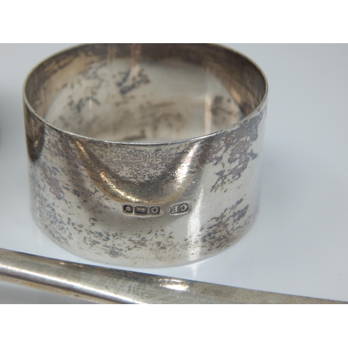 149I - Hallmarked Silver Rat Tail Serving Spoon together with two Hallmarked Silver Napkin Rings. Various D... 