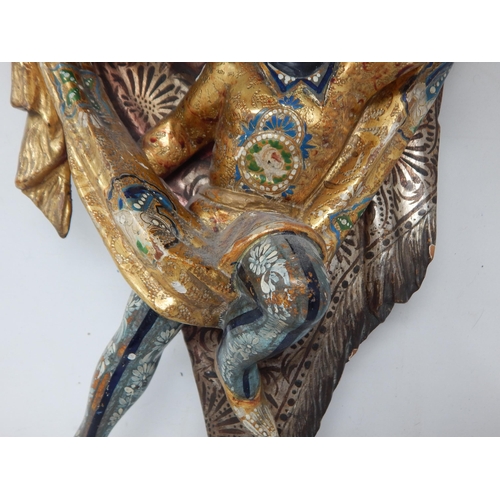 389 - A late 19th century Italian Venetian carved wood wall bracket, in the form of a blackamoor Harlequin... 