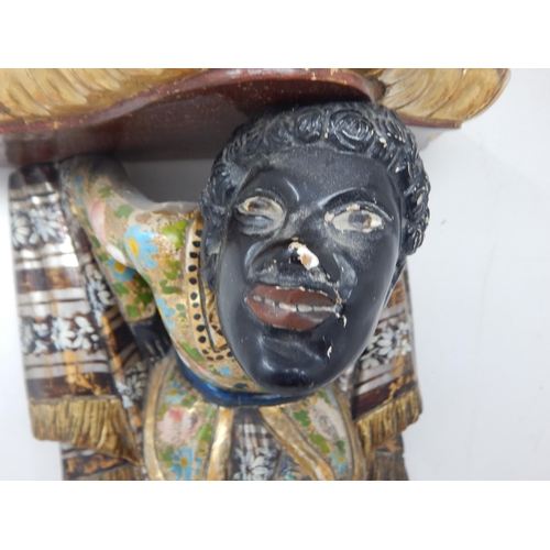 390 - A late 19th century Italian Venetian carved wood wall bracket, in the form of a blackamoor Harlequin... 